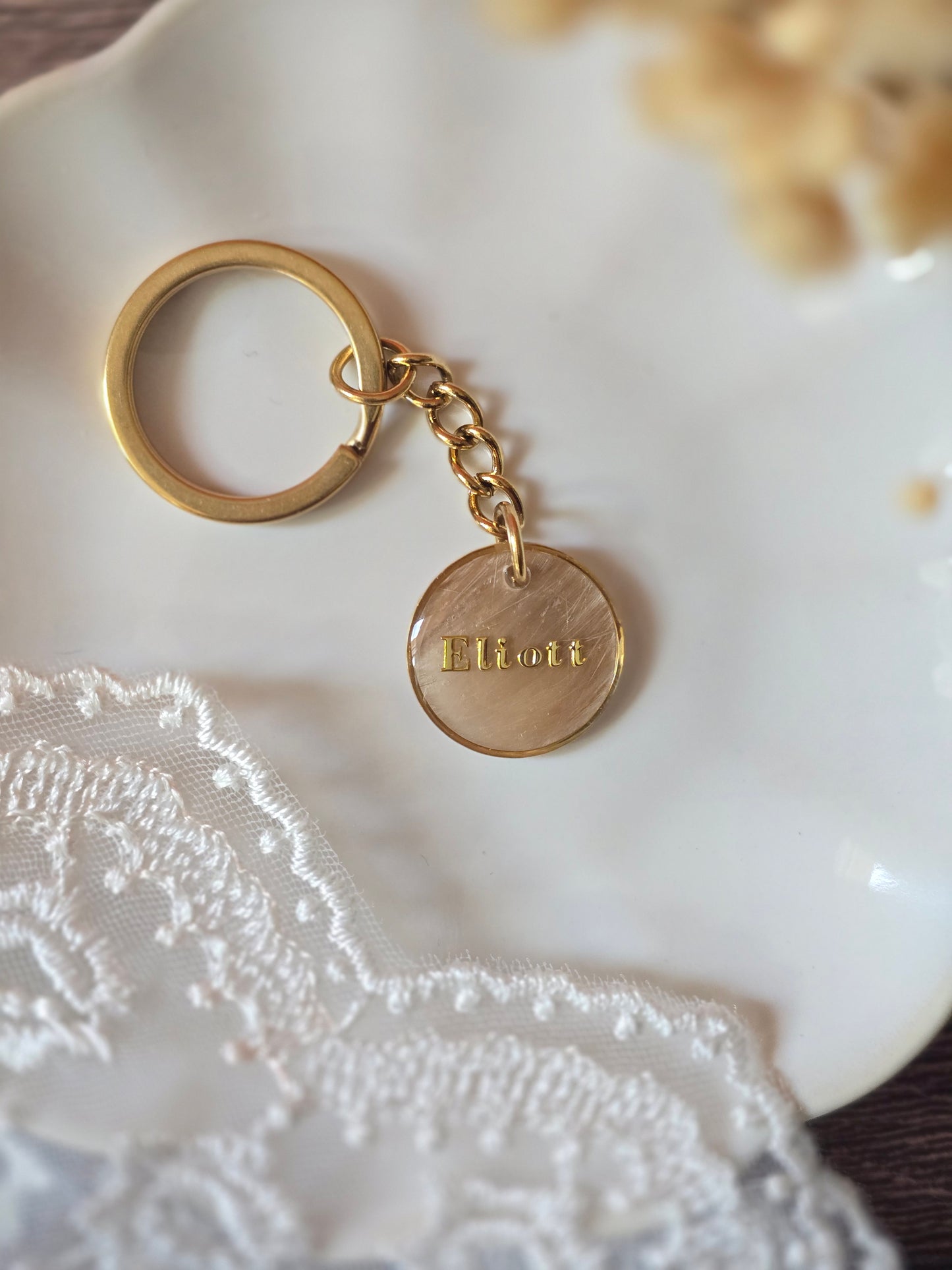 Portes clés doré ( Bijoux souvenirs)