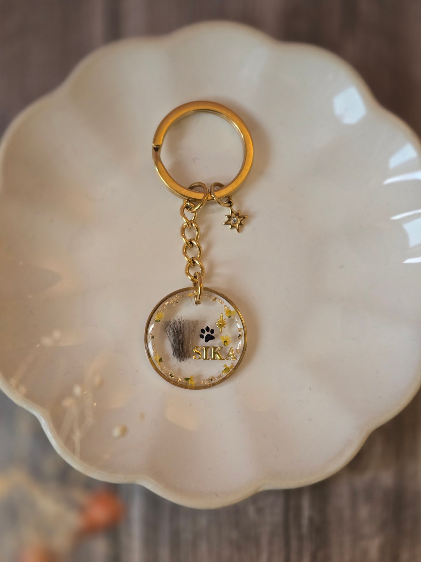 Portes clés doré ( Bijoux souvenirs)