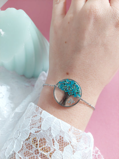 Bijoux souvenir bracelet avec des cheveux en forme d'arbre de vie et des fleurs bleus